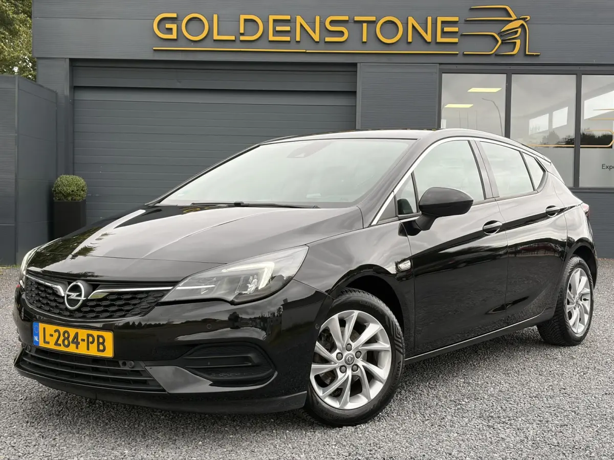 1.2 Business Elegance 2e Eigenaar l Navi l Camera l Carplay l Keyless l Trekhaak l 110pk l Pdc V+A l Halfleder l 6 Bak l N.A.P l | Lm velgen l Rijstrooksensor l Apk tot 07-2027