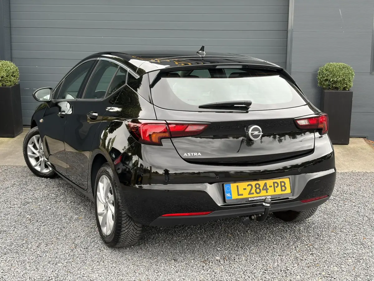 1.2 Business Elegance 2e Eigenaar l Navi l Camera l Carplay l Keyless l Trekhaak l 110pk l Pdc V+A l Halfleder l 6 Bak l N.A.P l | Lm velgen l Rijstrooksensor l Apk tot 07-2027