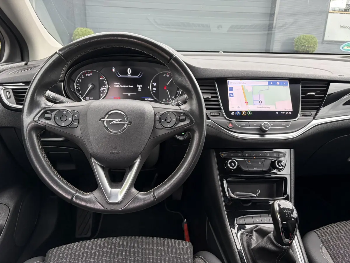 1.2 Business Elegance 2e Eigenaar l Navi l Camera l Carplay l Keyless l Trekhaak l 110pk l Pdc V+A l Halfleder l 6 Bak l N.A.P l | Lm velgen l Rijstrooksensor l Apk tot 07-2027