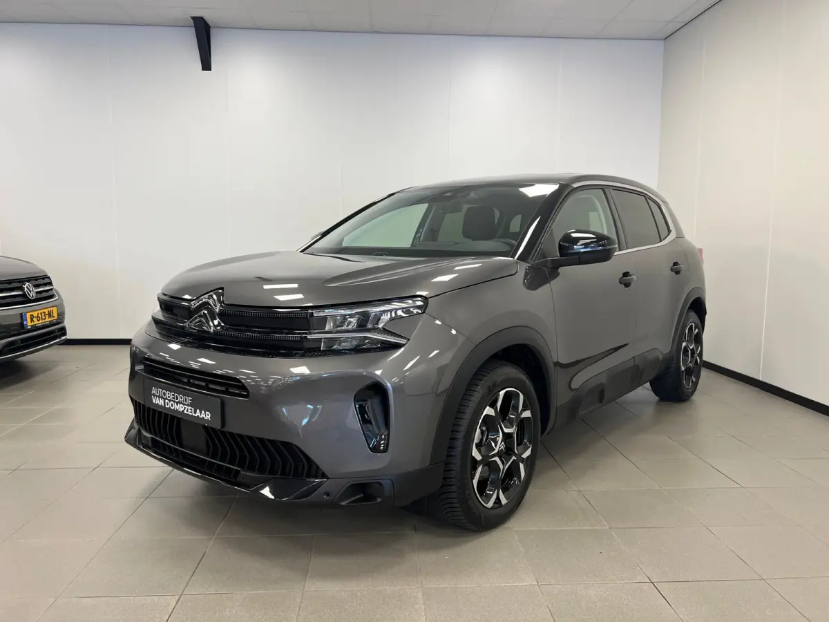 1.2 HYBRID 145PK AUTOMAAT PLUS UITV. / NAVI / STOEL-VERW. / KEYLESS / CAMERA / CRUISE.C /