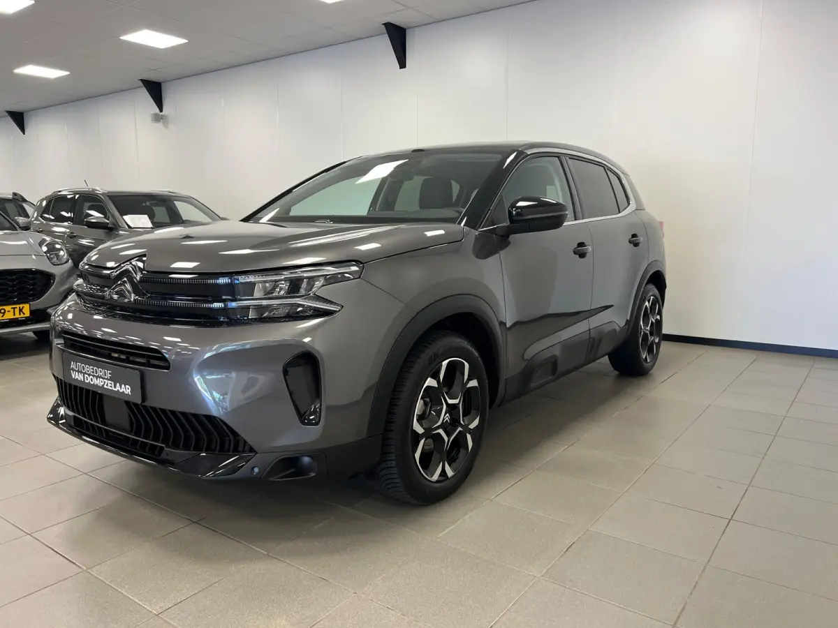 1.2 HYBRID 145PK AUTOMAAT PLUS UITV. / NAVI / STOEL-VERW. / KEYLESS / CAMERA / CRUISE.C /