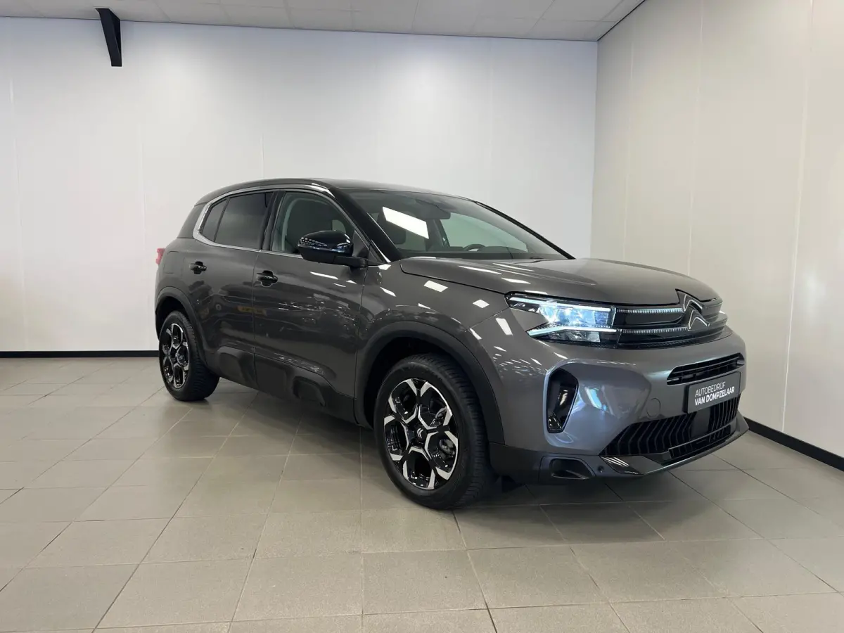 1.2 HYBRID 145PK AUTOMAAT PLUS UITV. / NAVI / STOEL-VERW. / KEYLESS / CAMERA / CRUISE.C /