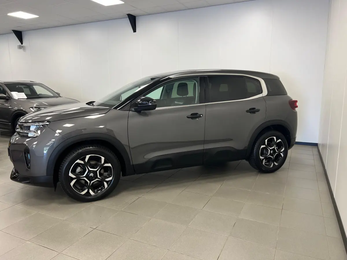 1.2 HYBRID 145PK AUTOMAAT PLUS UITV. / NAVI / STOEL-VERW. / KEYLESS / CAMERA / CRUISE.C /
