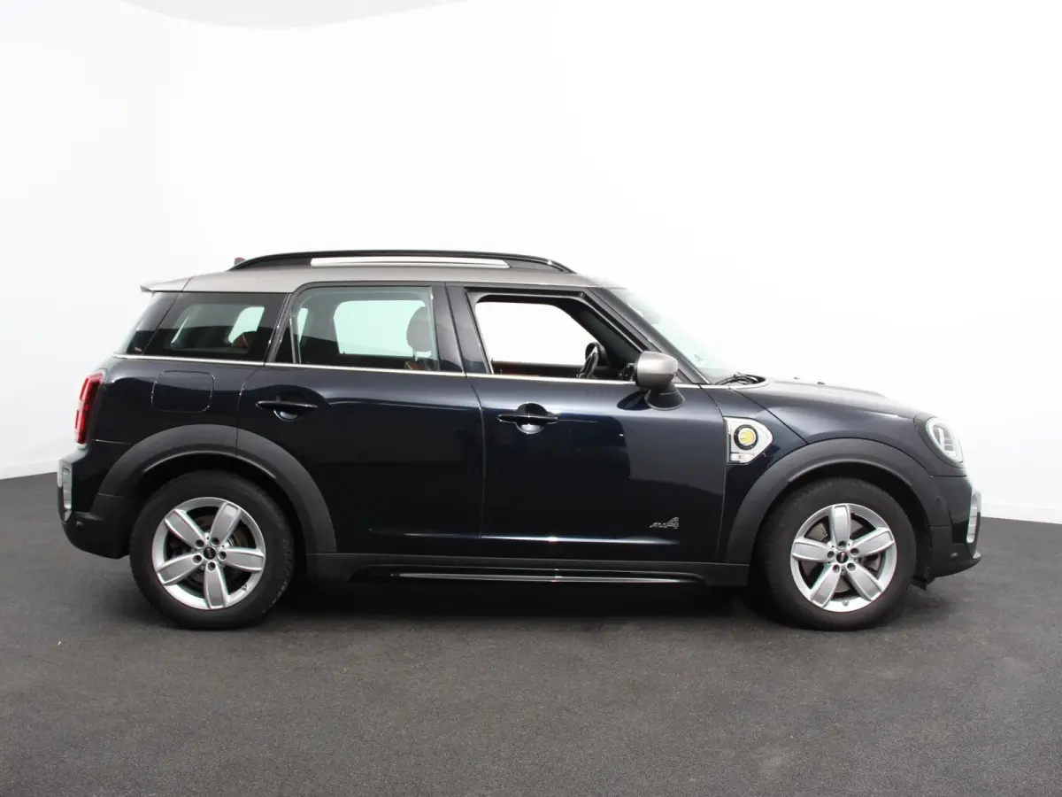 1.5 Cooper PHEV ALL4 Chili Automaat Climate control Adaptieve cruise control HUD Lichtmetalen velgen Navigatie Parkeersensoren Camera Stoelverwarming