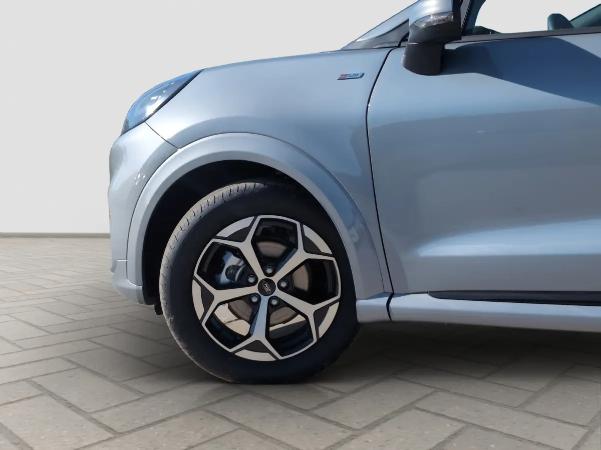 1.0 EcoBoost ST-Line | Achteruitrijcamera | All Weather banden | Buitenspiegels elektrisch verstel- en verwarmbaar