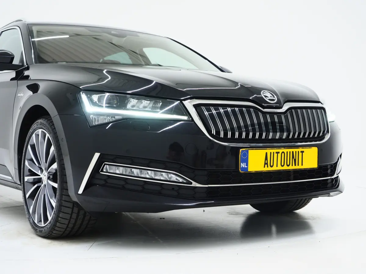 1.4 TSI iV Laurin & Klement | Leder | Trekhaak | Stoelventilatie | Massage | Canton | Keyless | Memory | Carplay