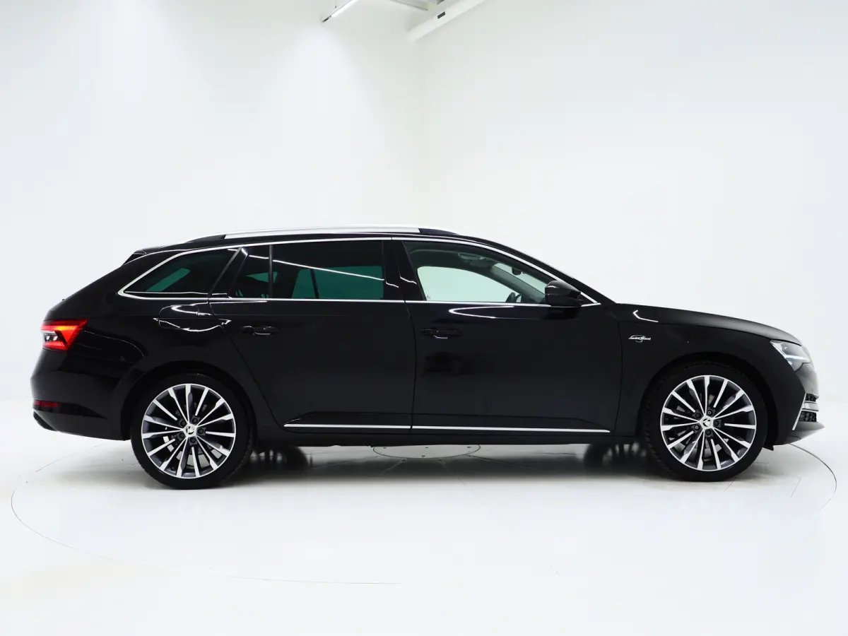 1.4 TSI iV Laurin & Klement | Leder | Trekhaak | Stoelventilatie | Massage | Canton | Keyless | Memory | Carplay