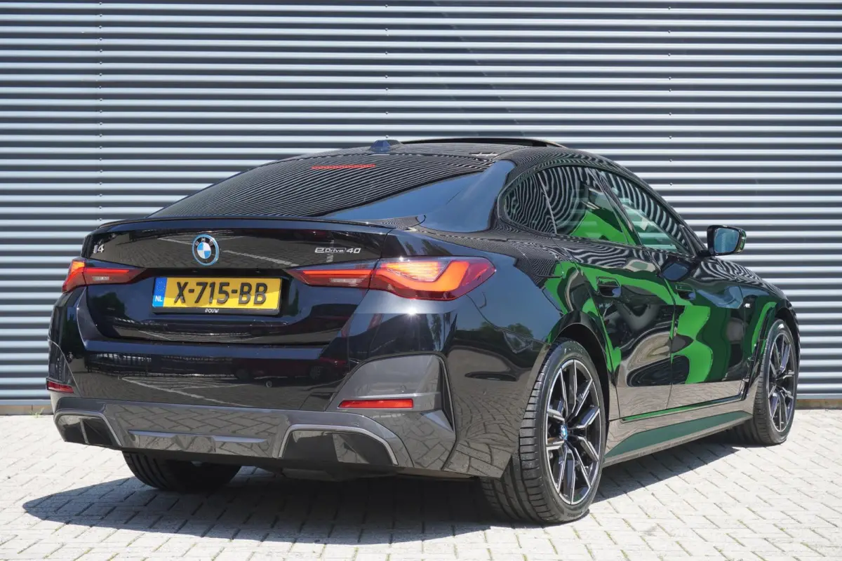 eDrive40 340pk High Executive 84 kWh | SoH 94% | M-Sport | Panoramadak | Adaptive Cruise | Stoelverwarming | Apple CarPlay