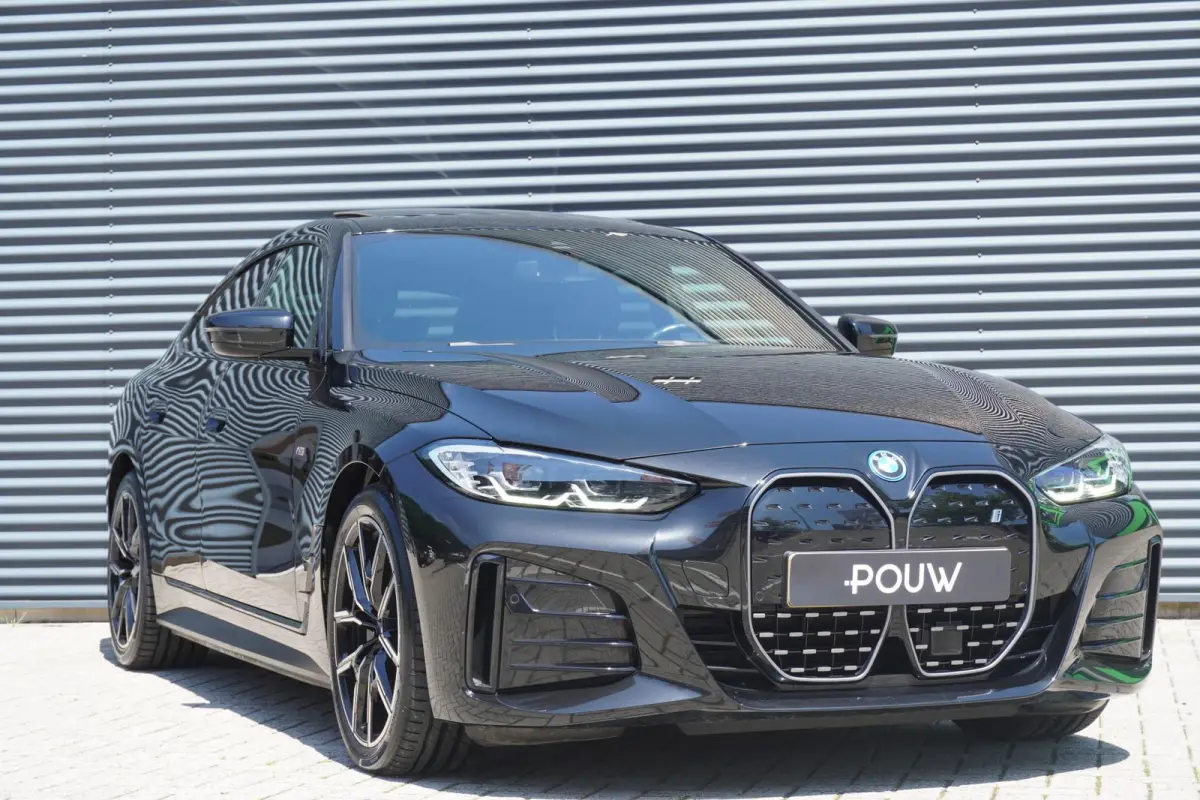 eDrive40 340pk High Executive 84 kWh | SoH 94% | M-Sport | Panoramadak | Adaptive Cruise | Stoelverwarming | Apple CarPlay