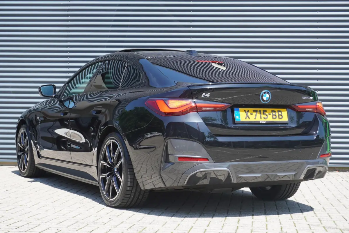 eDrive40 340pk High Executive 84 kWh | SoH 94% | M-Sport | Panoramadak | Adaptive Cruise | Stoelverwarming | Apple CarPlay