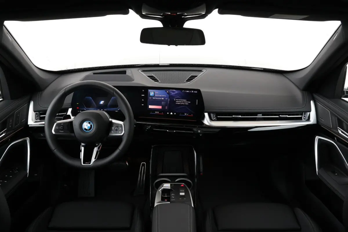 eDrive20 67 kWh M Sport Edition | Sport Pakket Pro | Panorama Dak | Stuur & Stoelverwarming | Driving Assistant Professional | Parking Assistant Plus | Head-Up | Harman Kardon | Elektr. Stoe