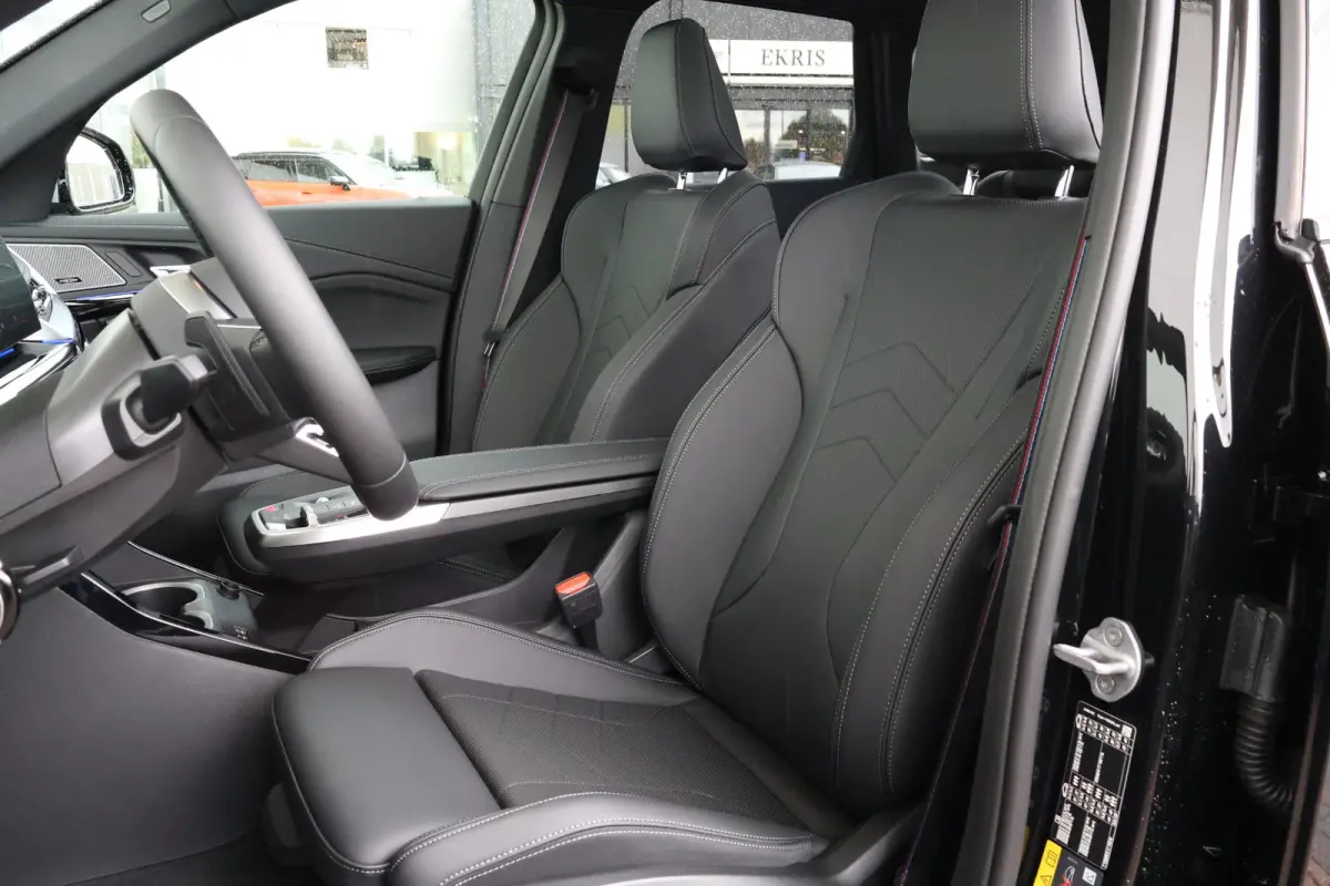 eDrive20 67 kWh M Sport Edition | Sport Pakket Pro | Panorama Dak | Stuur & Stoelverwarming | Driving Assistant Professional | Parking Assistant Plus | Head-Up | Harman Kardon | Elektr. Stoe