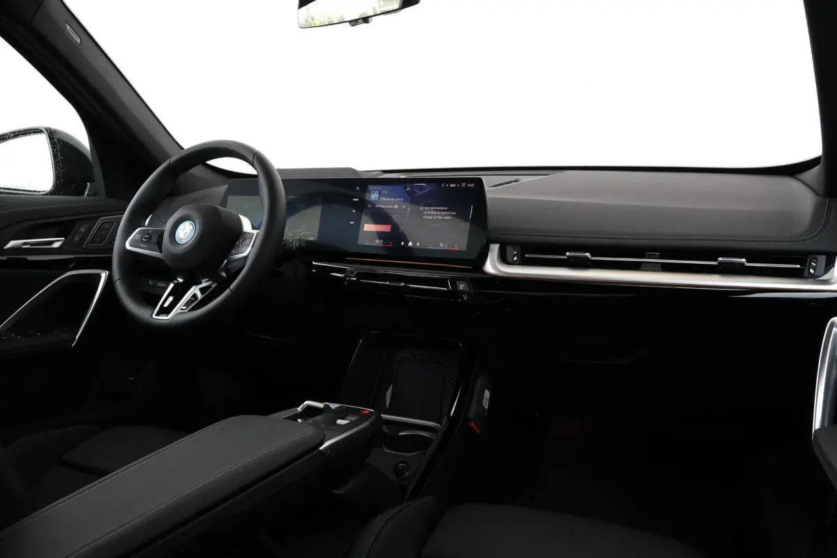 eDrive20 67 kWh M Sport Edition | Sport Pakket Pro | Panorama Dak | Stuur & Stoelverwarming | Driving Assistant Professional | Parking Assistant Plus | Head-Up | Harman Kardon | Elektr. Stoe