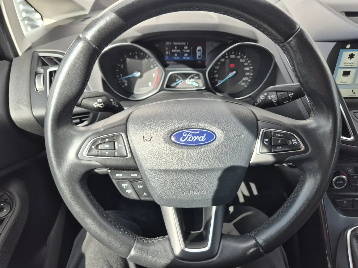 1.0 Titanium airco,cruisecontrol,navigatie/camera,parkeersensoren,