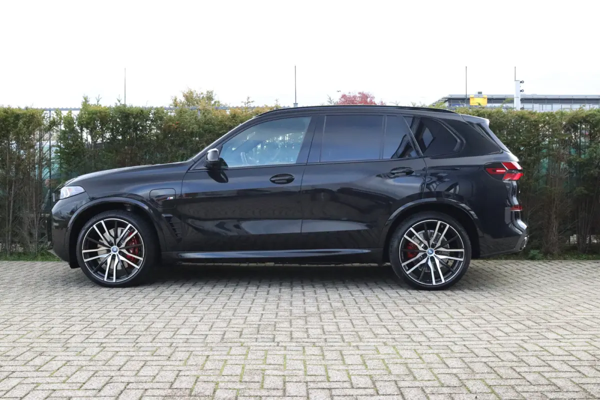 xDrive50e M-SPORT PRO | Trekhaak | Skylounge | Tartufo | 4-wielsturing  | HiFi | Pano | Memory | Carplay | Stuurverwarming | Cruise Control