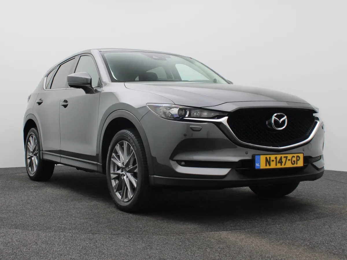 2.0 SkyActiv-G 165 Comfort | AUTOMAAT | Trekhaak | Lederen bekl. | BOSE Audio |