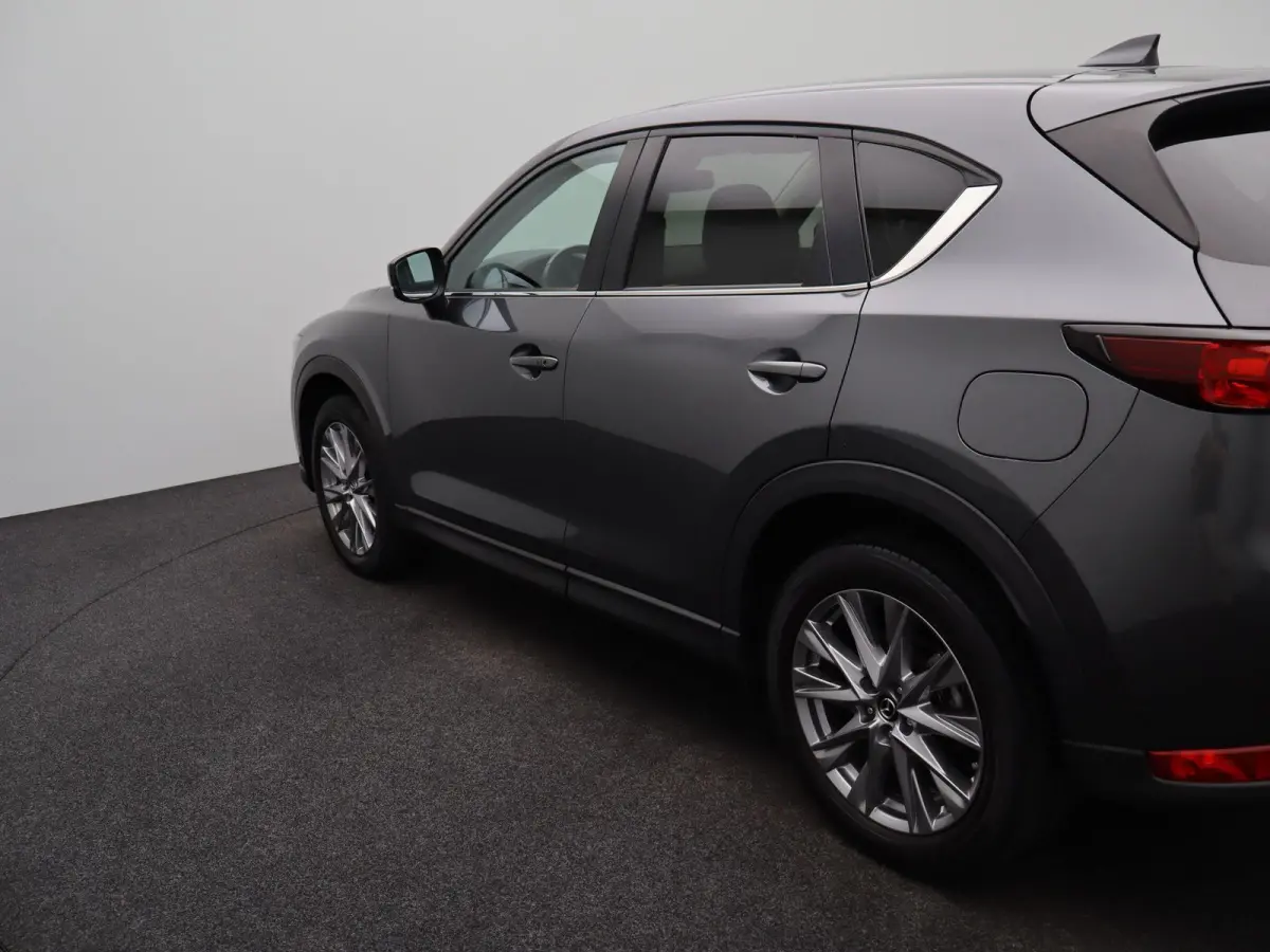 2.0 SkyActiv-G 165 Comfort | AUTOMAAT | Trekhaak | Lederen bekl. | BOSE Audio |
