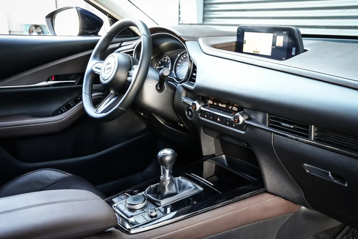 2.0 e-SkyActiv-G M Hybrid Comfort | CarPlay | Clima | ACC | Trekhaak | Leder | Navi | 360 camera |