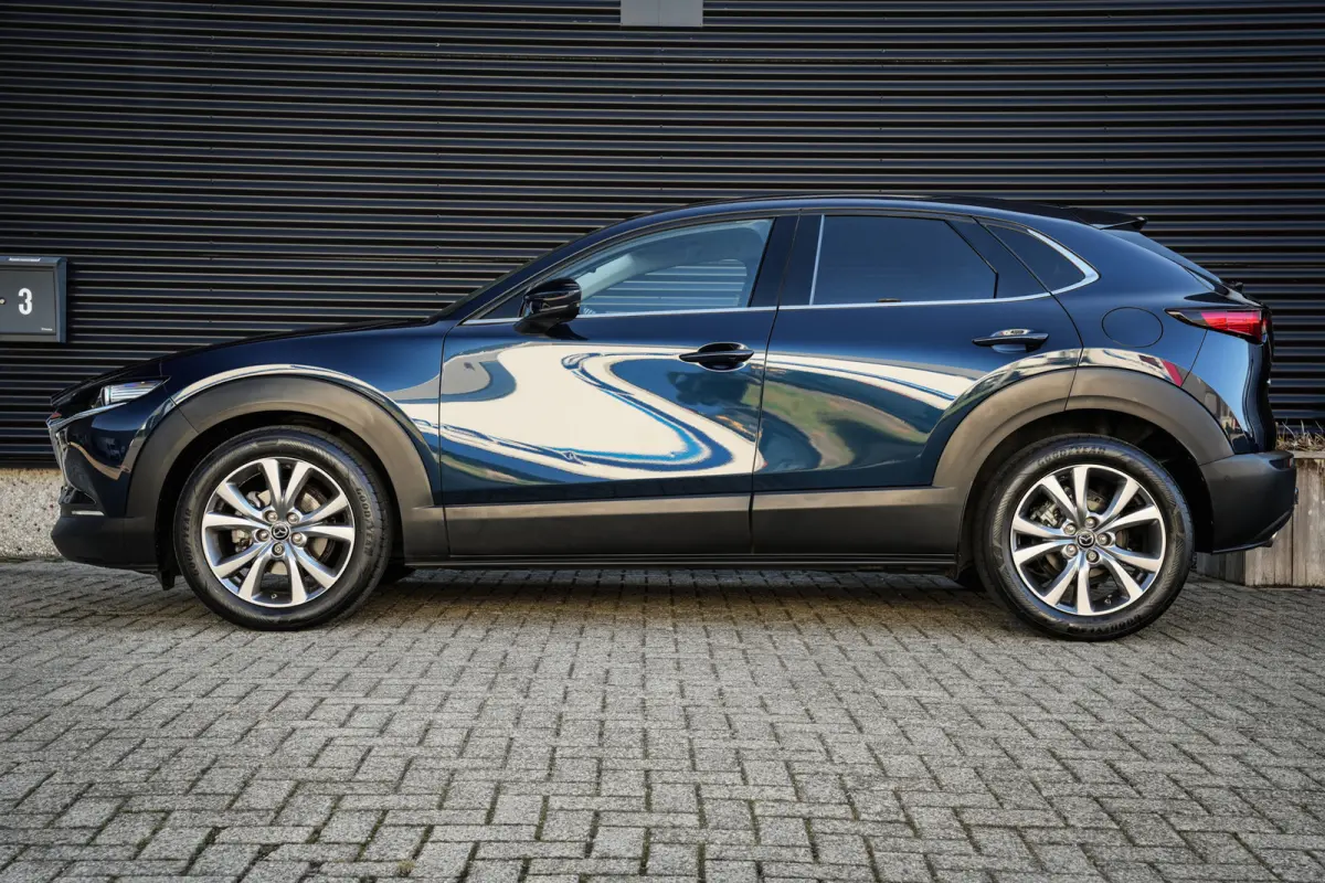 2.0 e-SkyActiv-G M Hybrid Comfort | CarPlay | Clima | ACC | Trekhaak | Leder | Navi | 360 camera |