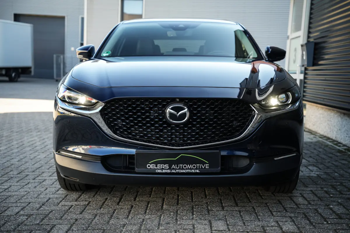 2.0 e-SkyActiv-G M Hybrid Comfort | CarPlay | Clima | ACC | Trekhaak | Leder | Navi | 360 camera |