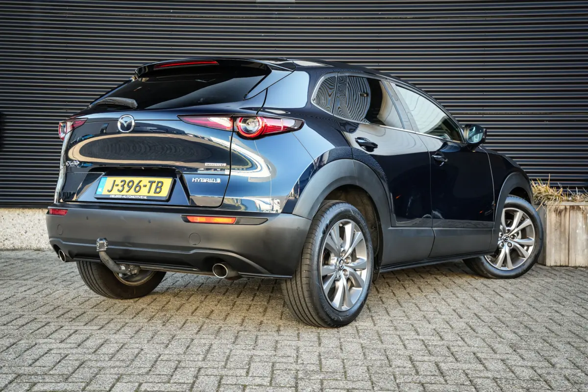 2.0 e-SkyActiv-G M Hybrid Comfort | CarPlay | Clima | ACC | Trekhaak | Leder | Navi | 360 camera |