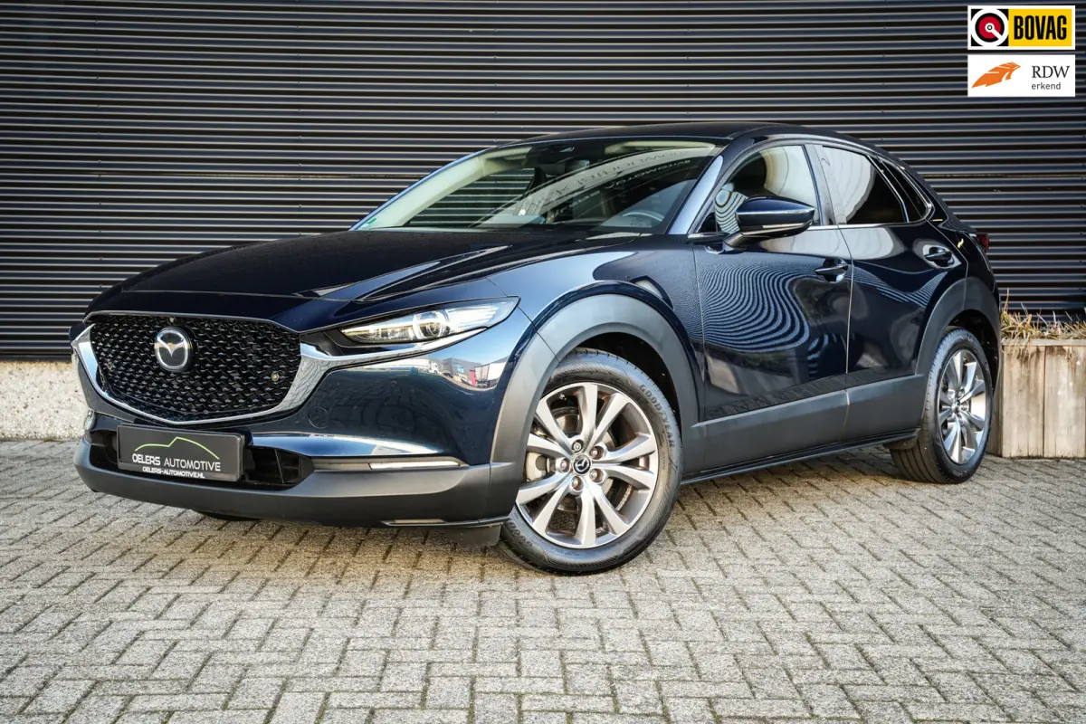 2.0 e-SkyActiv-G M Hybrid Comfort | CarPlay | Clima | ACC | Trekhaak | Leder | Navi | 360 camera |