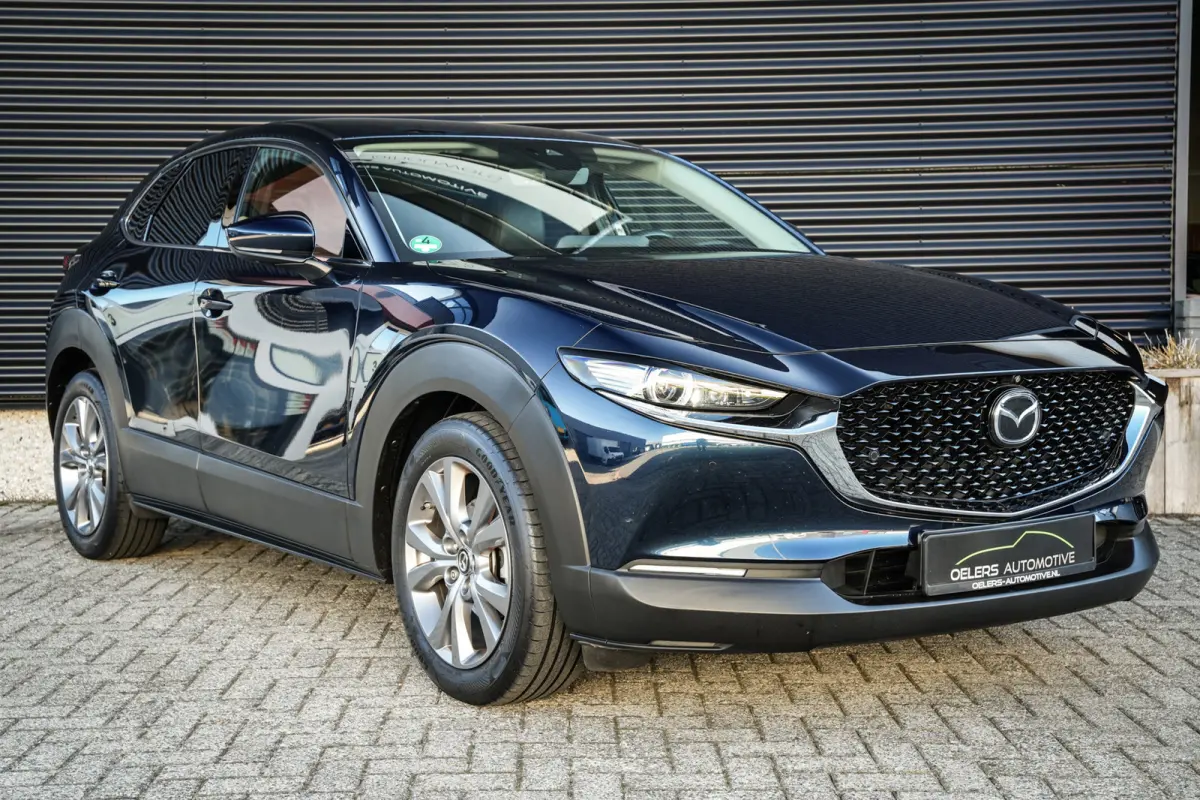 2.0 e-SkyActiv-G M Hybrid Comfort | CarPlay | Clima | ACC | Trekhaak | Leder | Navi | 360 camera |
