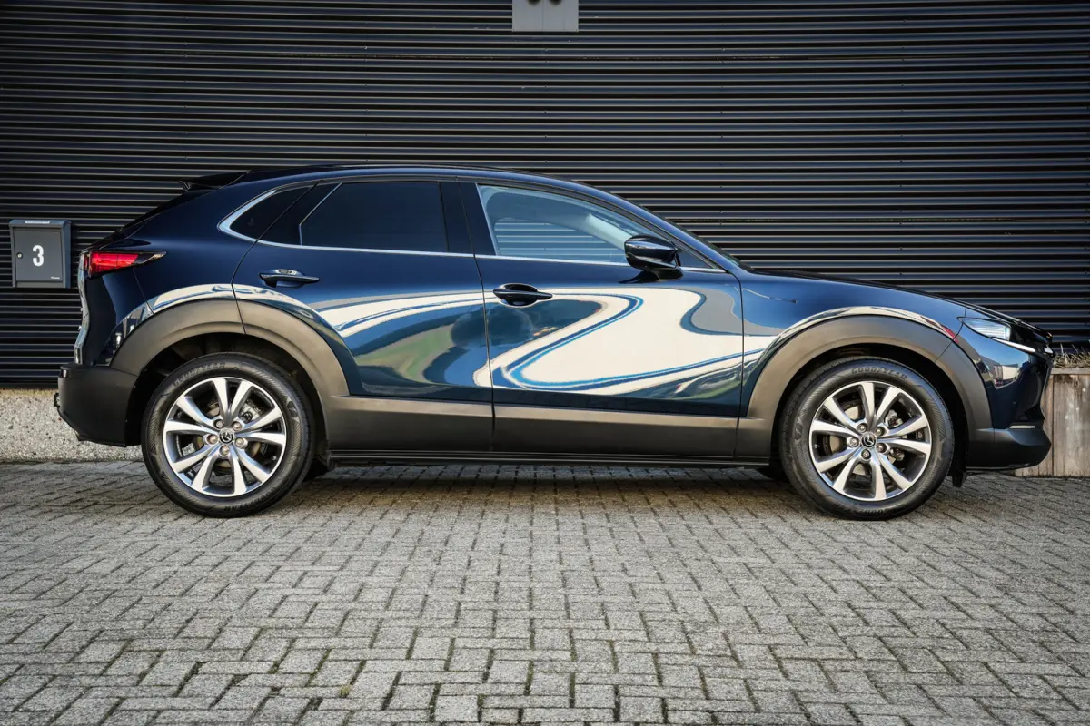 2.0 e-SkyActiv-G M Hybrid Comfort | CarPlay | Clima | ACC | Trekhaak | Leder | Navi | 360 camera |