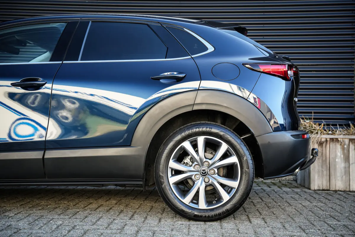 2.0 e-SkyActiv-G M Hybrid Comfort | CarPlay | Clima | ACC | Trekhaak | Leder | Navi | 360 camera |