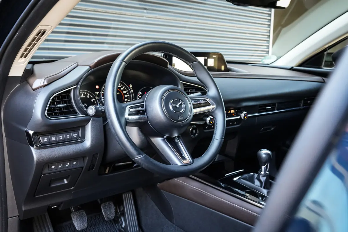 2.0 e-SkyActiv-G M Hybrid Comfort | CarPlay | Clima | ACC | Trekhaak | Leder | Navi | 360 camera |