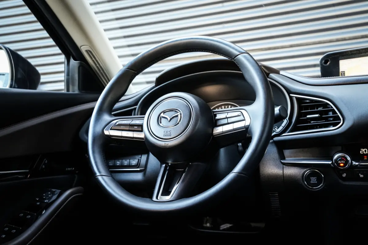 2.0 e-SkyActiv-G M Hybrid Comfort | CarPlay | Clima | ACC | Trekhaak | Leder | Navi | 360 camera |