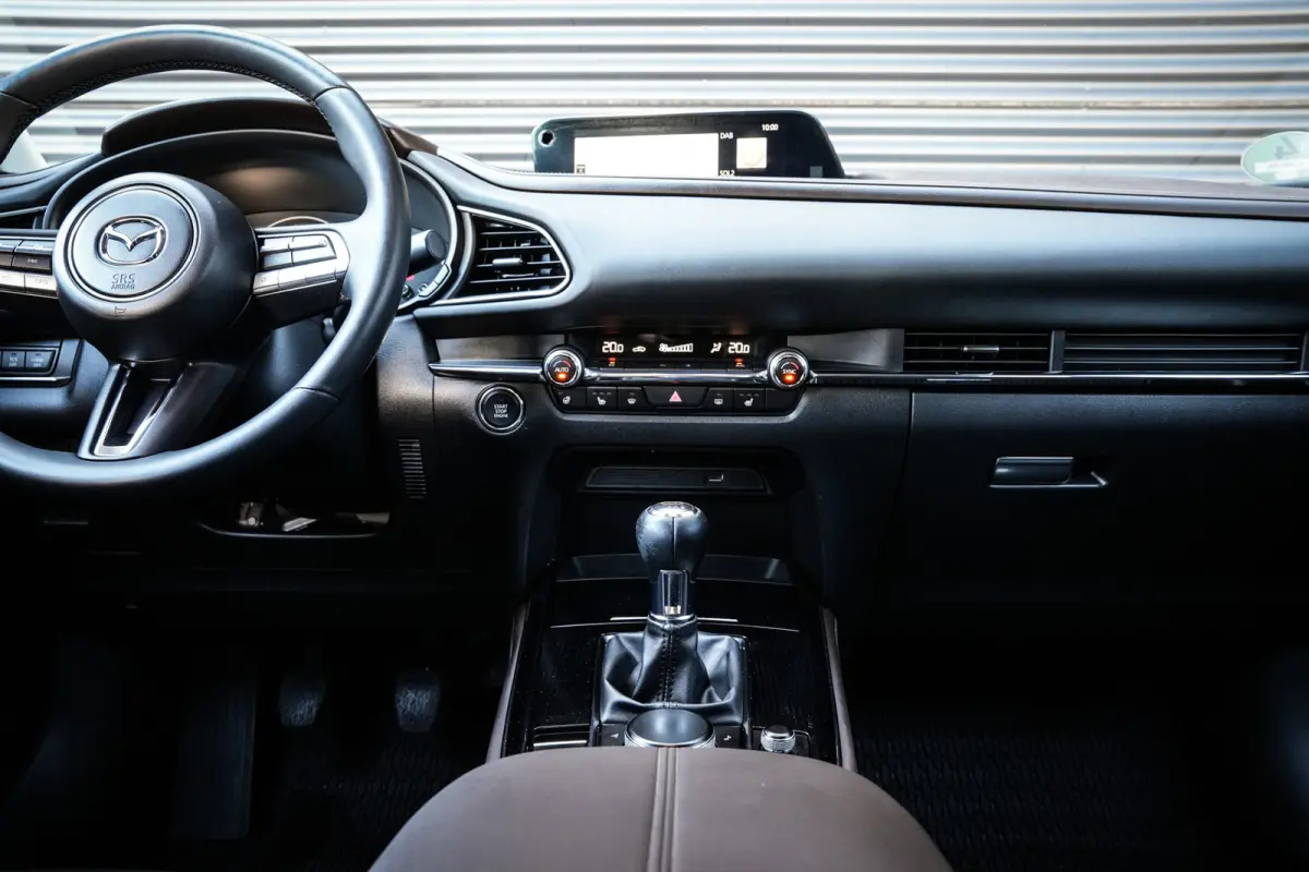 2.0 e-SkyActiv-G M Hybrid Comfort | CarPlay | Clima | ACC | Trekhaak | Leder | Navi | 360 camera |