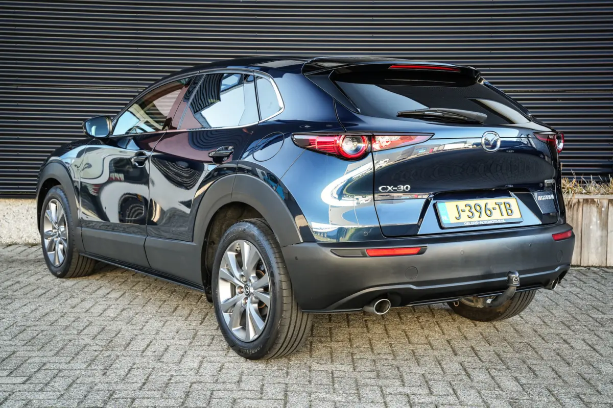 2.0 e-SkyActiv-G M Hybrid Comfort | CarPlay | Clima | ACC | Trekhaak | Leder | Navi | 360 camera |