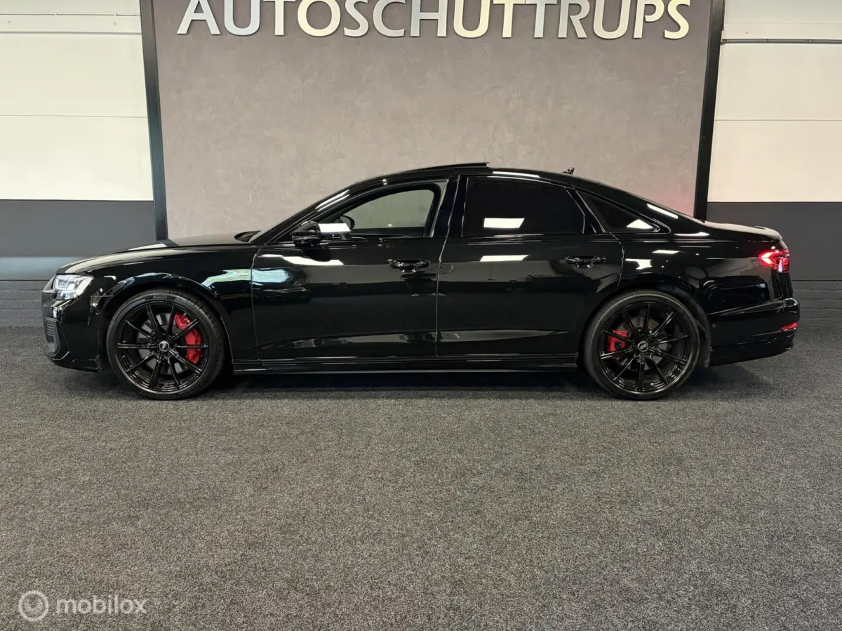 60 TFSI S-LINE 4WS / BLACK OPTIC+ / MATRIX / BOWERS & WILKINS / 21" / PANO / VALCONA / SFEER / STOELVERW. / STOELKOELING /
