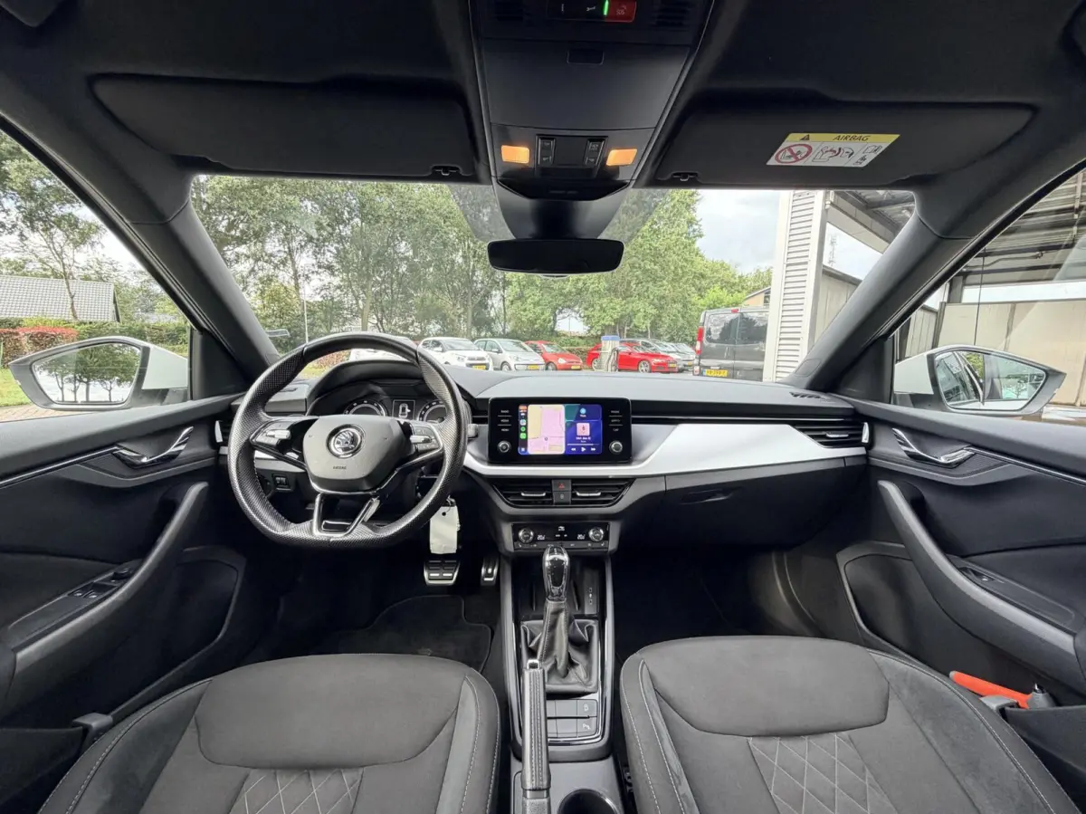 1.0 TSI Sport Business | Automaat | Stoelverwarming | Carplay | Dealer Onderhouden