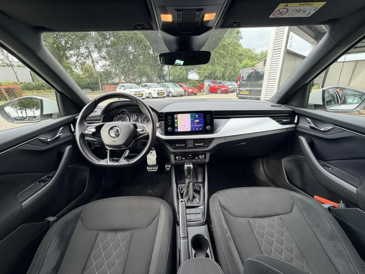 1.0 TSI Sport Business | Automaat | Stoelverwarming | Carplay | Dealer Onderhouden