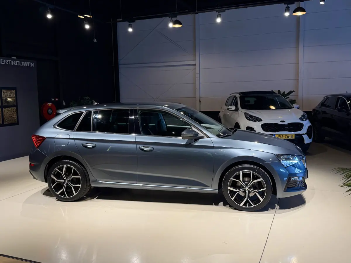 1.0 TSI DSG Ambition Navi|Carplay|LED|Stoelverw Grijs