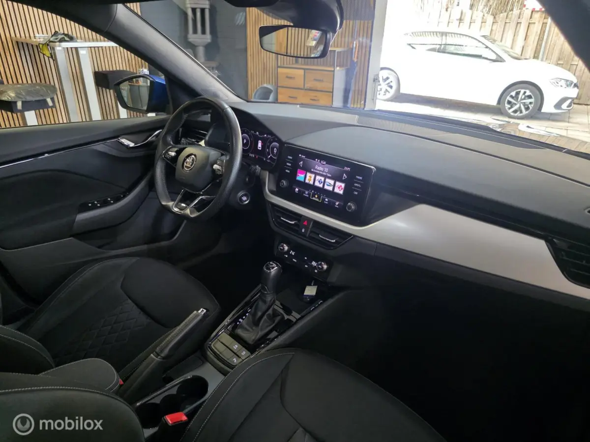 1.0 TSI Sport Business/ Panorama dak / Achteruitrij camera / Adaptieve cruise control /