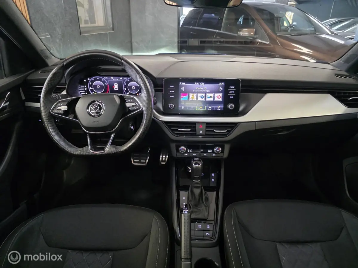 1.0 TSI Sport Business/ Panorama dak / Achteruitrij camera / Adaptieve cruise control /