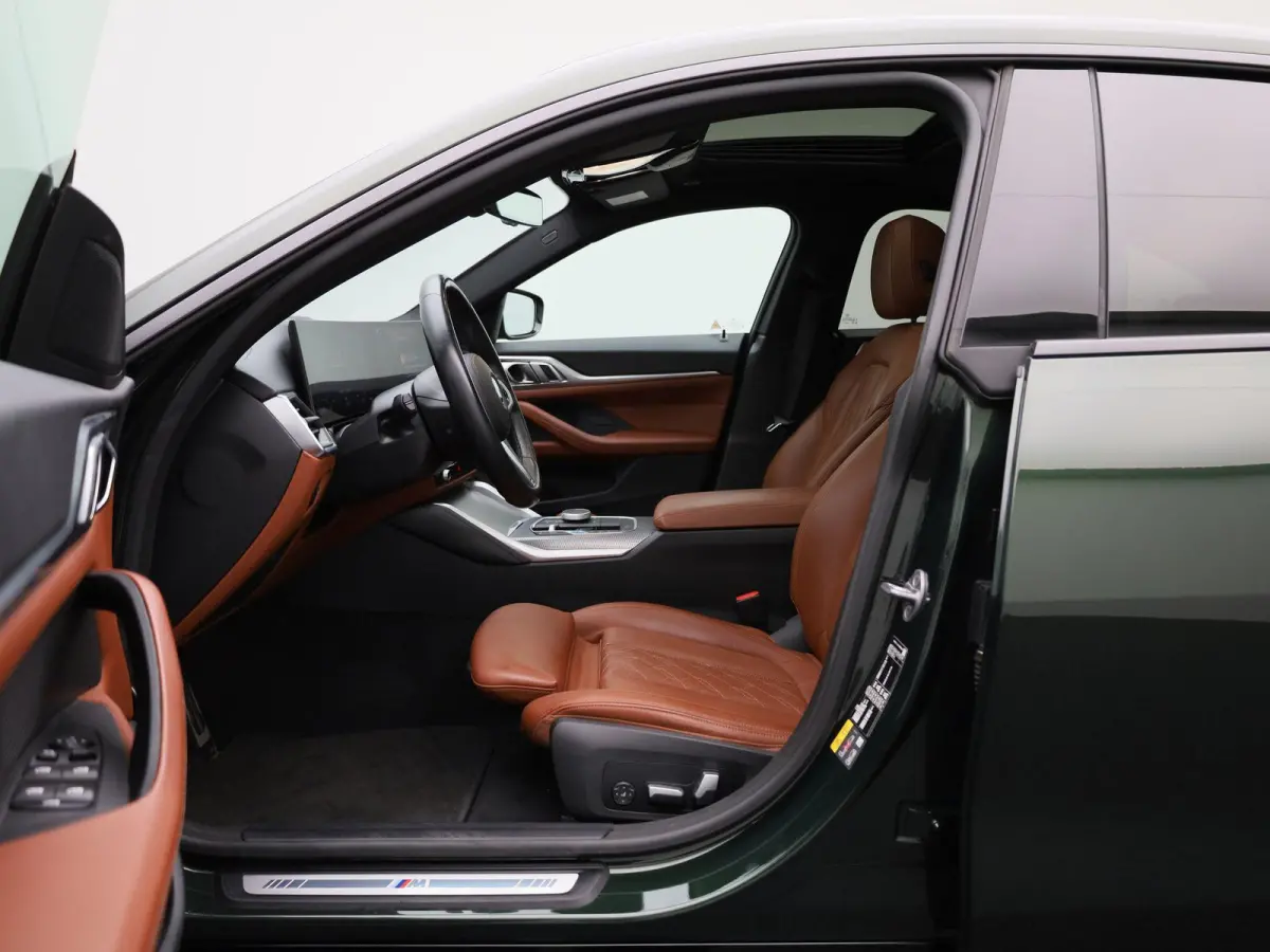 eDrive40 High Executive 84 kWh M-PAKKET | STOEL KOELING EN VERWARMING | PANORAMADAK | ADEPTIVE CRUISE | HUD| MEMORY STOELEN | CAMERA | KEYLESS | STOELVERWARMING ACHTER |