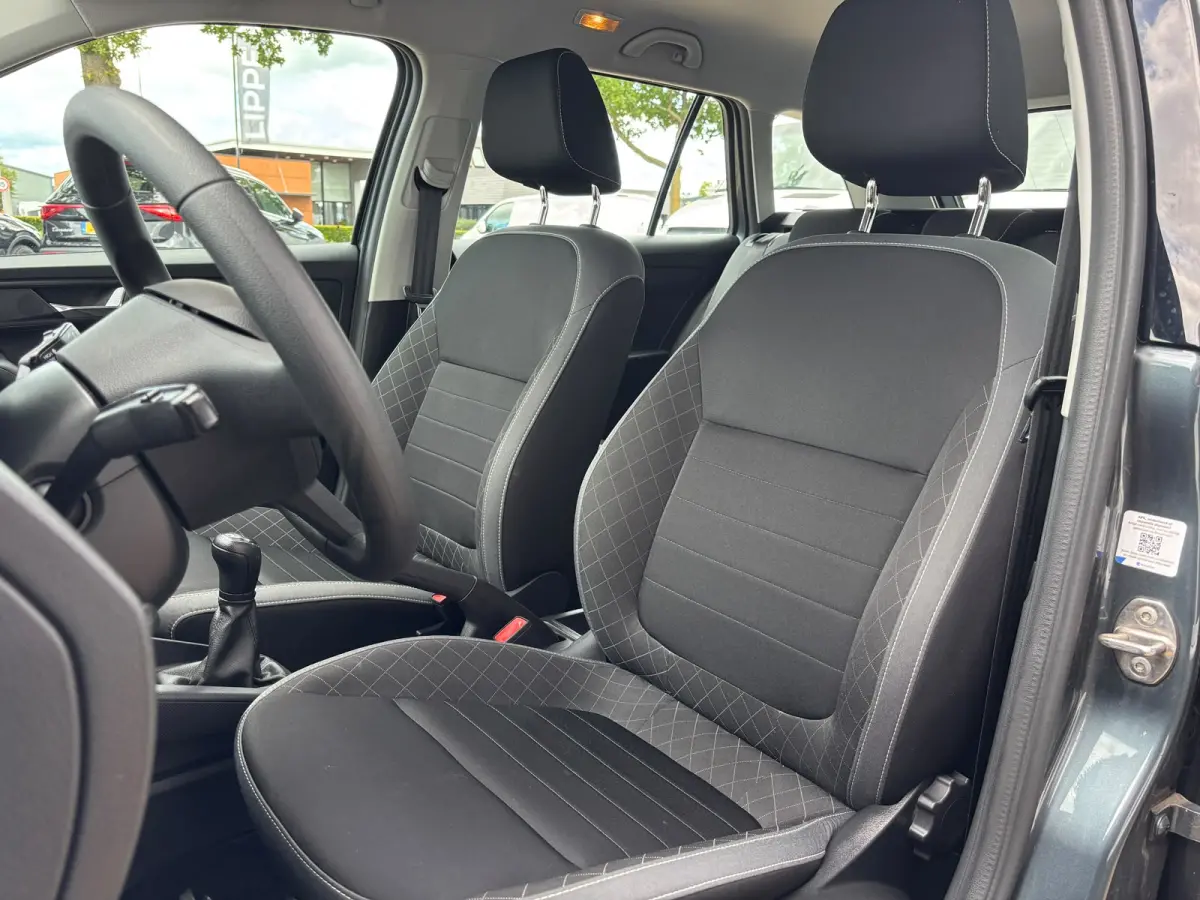 1.0 TSI Ambition | Stoelverwarming | Bluetooth | Cruise | Airco