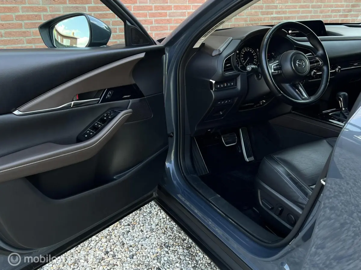 2.0 e-SkyActiv-G M Hybrid Comfort | 360° Camera | BOSE | Leer | HUD | Stuurverw. | Stoelverw.