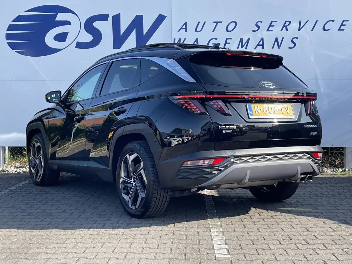 1.6 T-GDI PHEV Premium Sky 4WD | Pano | Leder | LED