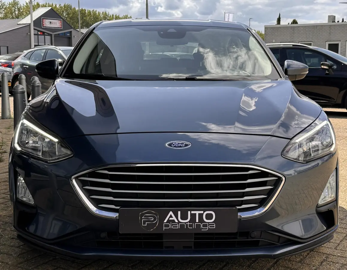 1.0 EcoBoost Trend Edition Business 125PK | NL AUTO | NAP | Onderhoudshistorie | Parkeersensoren Voor en Achter | Airco | Navigatie | Cruise Control | Lichtmetalen Velgen | 2 Sleutels |