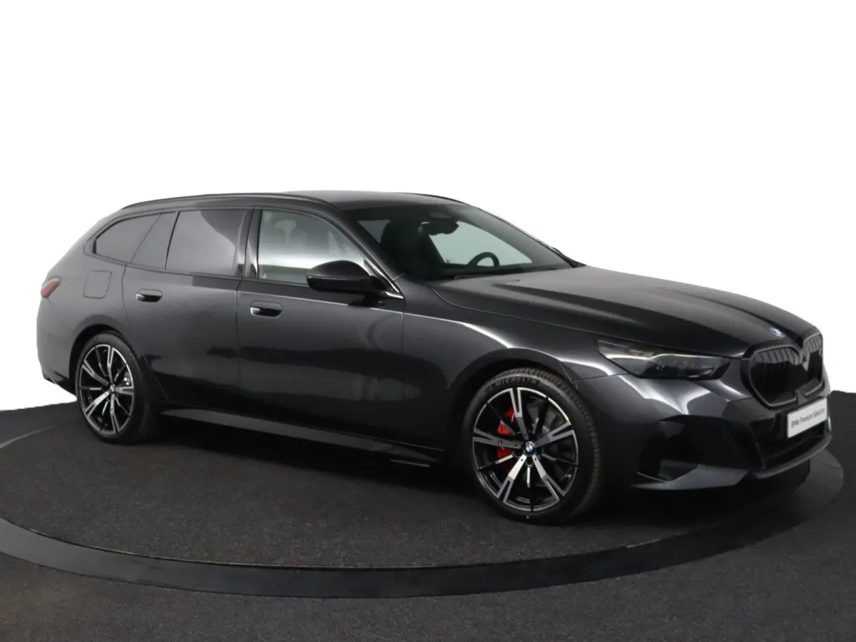 eDrive40 M Sport Edition 84 kWh | SOH 100% | M Sportpakket Pro | Trekhaak | Innovation Pack | Travel Pack