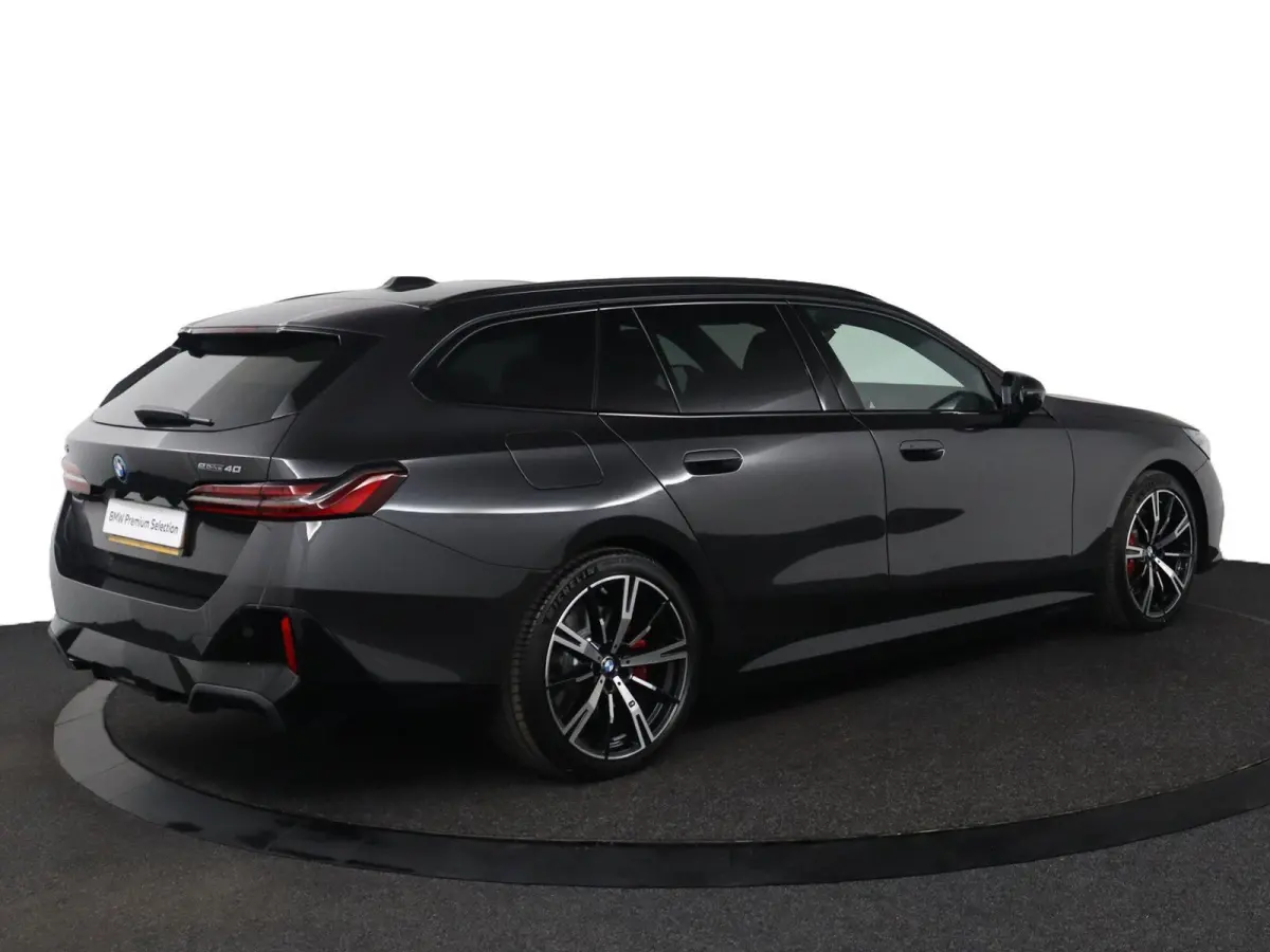eDrive40 M Sport Edition 84 kWh | SOH 100% | M Sportpakket Pro | Trekhaak | Innovation Pack | Travel Pack
