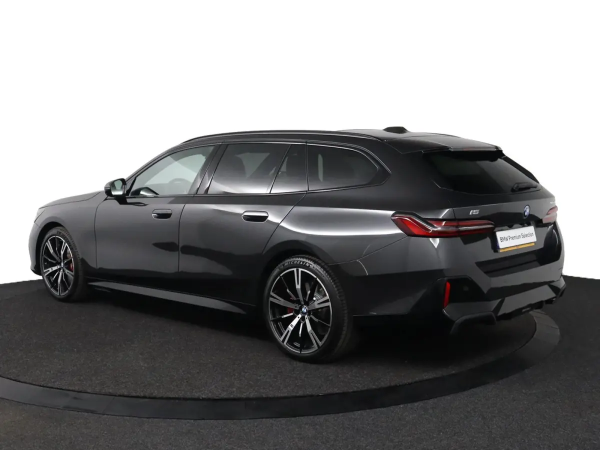 eDrive40 M Sport Edition 84 kWh | SOH 100% | M Sportpakket Pro | Trekhaak | Innovation Pack | Travel Pack