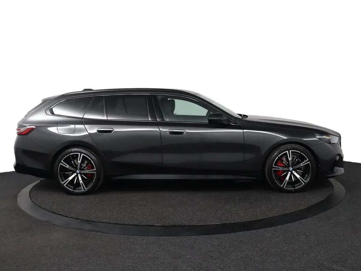 eDrive40 M Sport Edition 84 kWh | SOH 100% | M Sportpakket Pro | Trekhaak | Innovation Pack | Travel Pack