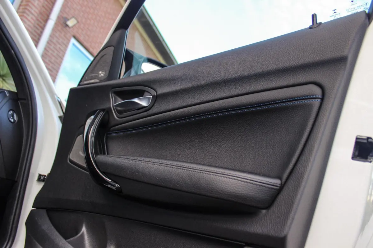 120i Edition M Sport Shadow High Executive | 2e eigenaar | Driving Assistant | Schuif-/kanteldak | Camera | Harman Kardon | Keyless entry | LED | M sport remmen | PDC