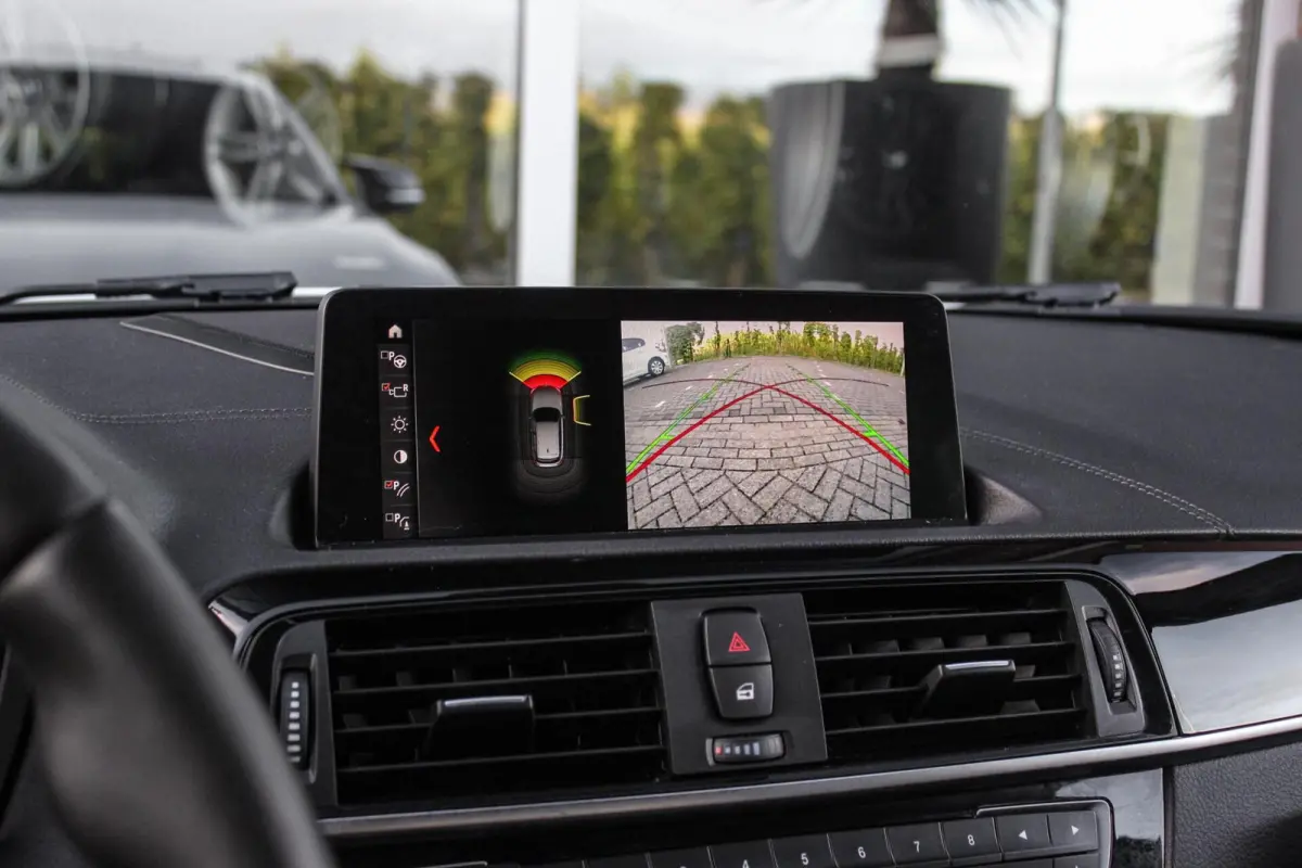 120i Edition M Sport Shadow High Executive | 2e eigenaar | Driving Assistant | Schuif-/kanteldak | Camera | Harman Kardon | Keyless entry | LED | M sport remmen | PDC